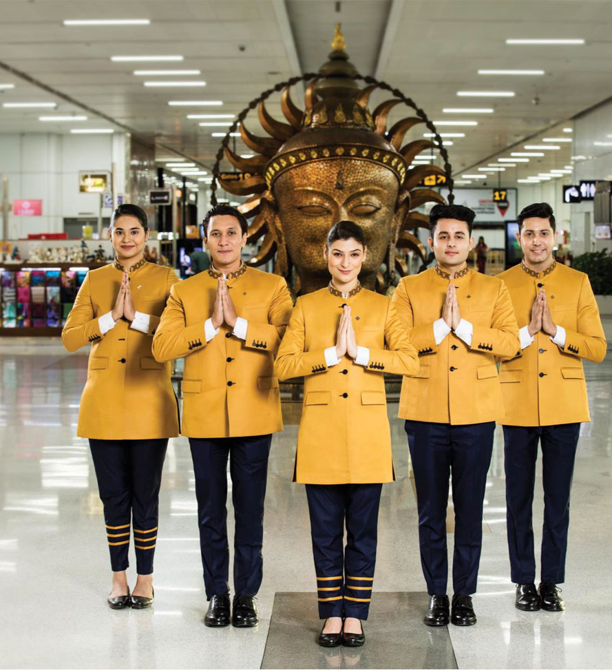 a group of people in uniform standing in greeting position